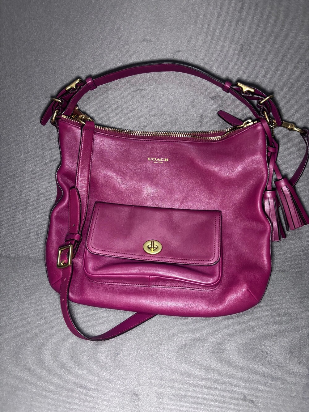 Coach Leather Shoulder Bag with Front Pocket and Tassels